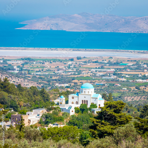 The church Kímissis tis Theotókou seen from Zia, a mountain village in Kos island, Greece photo