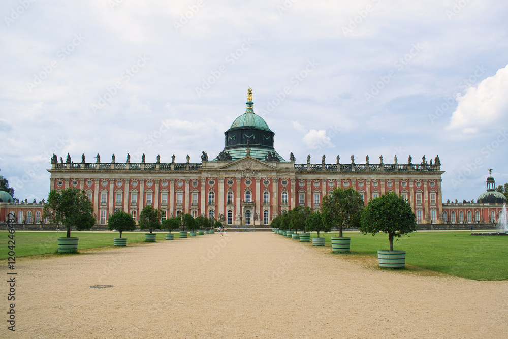 Obraz premium Grand Palace Sanssouci with Dome and Manicured Gardens
