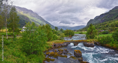 Obraz na płótnie Olden Norway 2024 hiking views towards Briksdal Glacier, Jostedal Glacier largest glacier on Europe's mainland. Glacial river flowing to Sognefjord. Scandinavia, Nordic. w salonie