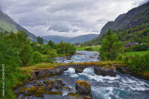 Obraz na płótnie Olden Norway 2024 hiking views towards Briksdal Glacier, Jostedal Glacier largest glacier on Europe's mainland. Glacial river flowing to Sognefjord. Scandinavia, Nordic. w salonie