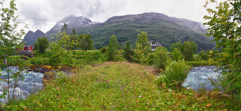 Olden Norway 2024 hiking views towards Briksdal Glacier, Jostedal Glacier largest glacier on Europe's mainland. Glacial river flowing to Sognefjord. Scandinavia, Nordic.