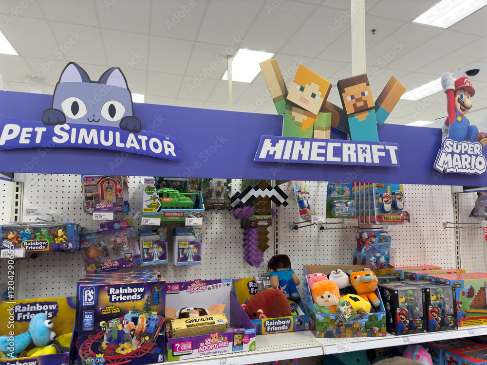 Naklejka premium Roblox Pet Simulator and Minecraft merchandise aisle inside Target department store.