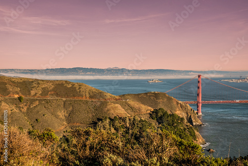 The golden gate bridge with the Alcatraz Island Prison in the background in San Francisco California USA