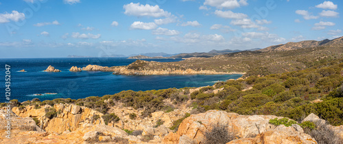 Obraz na płótnie Landscape of the south-west coast of Sardinia with cliffs, blue sea, fjords and white clouds w salonie