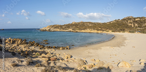Obraz na płótnie The beautiful beach of Cala Cipolla in Chia in Sardinia, with white sand and transparent and turquoise water w salonie