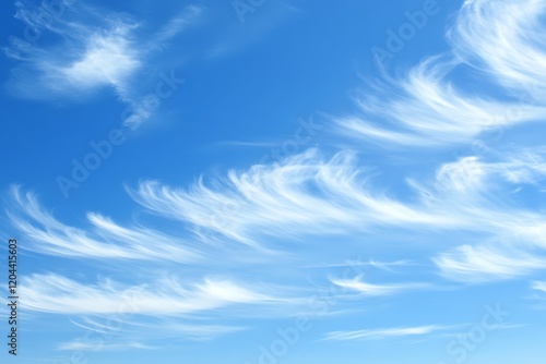 Cirrus Fibratus Cloudscape: Delicate White Wisps Across Vivid Blue Sky