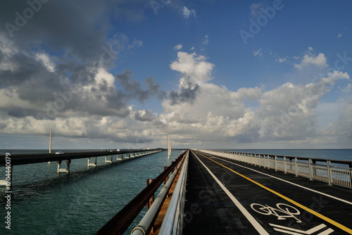 Pedestrian excercise and walkway alongside the seven mile bridge (7-mile bridge) in the Florida Keys offering pedestrians and cyclists their own path out over the water photo