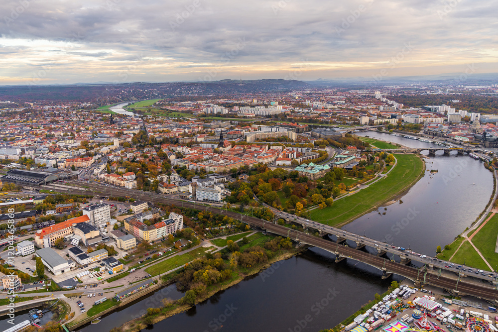 Naklejka premium Panoramic view of Dresden from hot air balloon. Elbe River flows through city, creating picturesque landscape. Germany. Aerial view