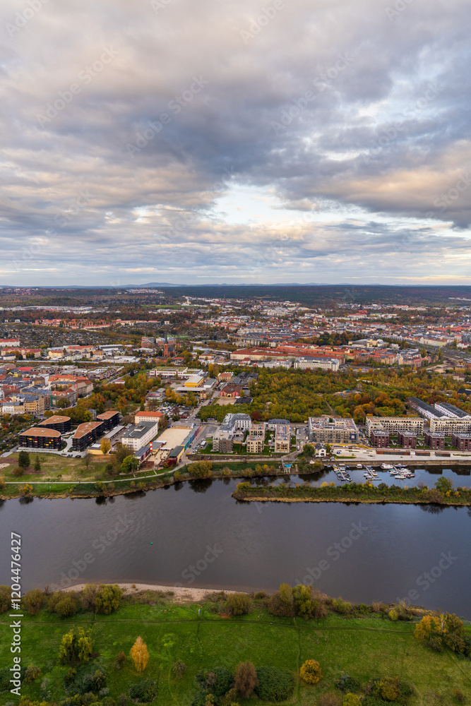 Beautiful view of city of Dresden from hot air balloon. Elbe River flows through city creating picturesque landscape, houses, bridge. Germany. Aerial view Dresden Beautiful view of city of Dresden from hot air balloon. Elbe River flows through city creating picturesque landscape, houses, bridge. Germany. Aerial view Dresden