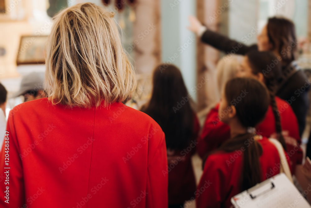 Group of kids children on excursion in a museum gallery, school pupils and students tour with guide, a docent with a tourists, young visitors wearing red, school field trip, art exhibition attendees Group of kids children on excursion in a museum gallery, school pupils and students tour with guide, a docent with a tourists, young visitors wearing red, school field trip, art exhibition attendees
