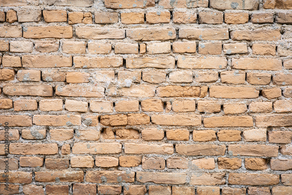 Obraz premium Rustic brick wall texture with red and brown tones