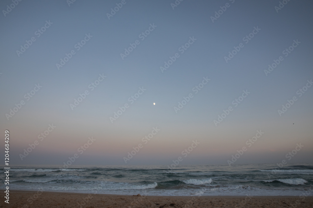 Sunset Over Peaceful Beach With Ocean Waves