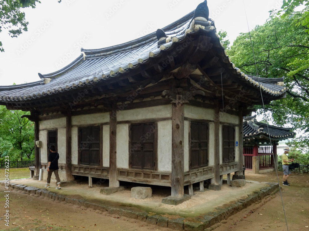 Beautiful traditional Korean wooden architecture, showcasing the elegance of Hanok style buildings. Beautiful traditional Korean wooden architecture, showcasing the elegance of Hanok style buildings.