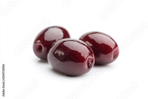 Isolated Greek kalamata olives in brine on a white background photo