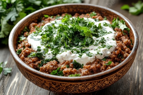 Kibbeh Labanieh bulgur and ground meat in yogurt sauce with cilantro photo