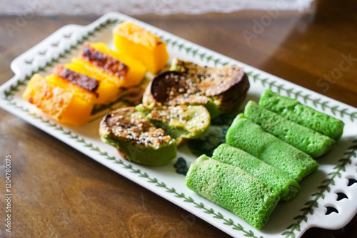 A plate of assorted traditional southeast asian desserts photo