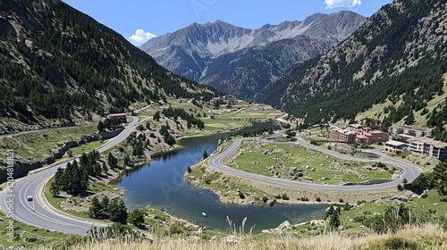 Mountain road curves by lake, village backdrop, travel