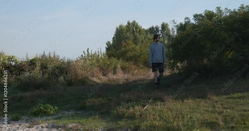 Young Caucasian Man Walks Hiking Countryside Nature Slow motion 60fps 4K 10-bit Young Caucasian Man Walks Hiking Countryside Nature Slow motion 60fps 4K 10-bit