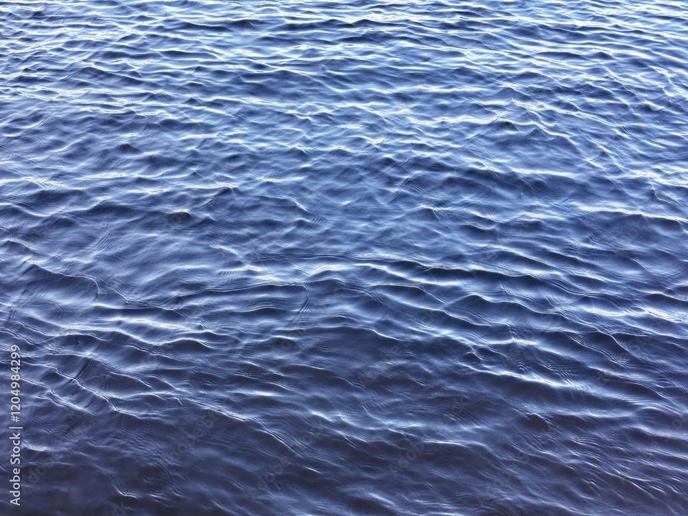 Naklejka premium River rippled cold water surface.