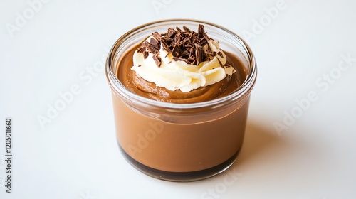 Keto chocolate mousse in a glass jar, topped with whipped cream and sugarfree chocolate shavings photo