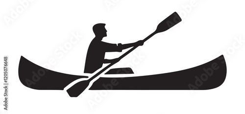 Silhouette of a Person in a Canoe Paddling