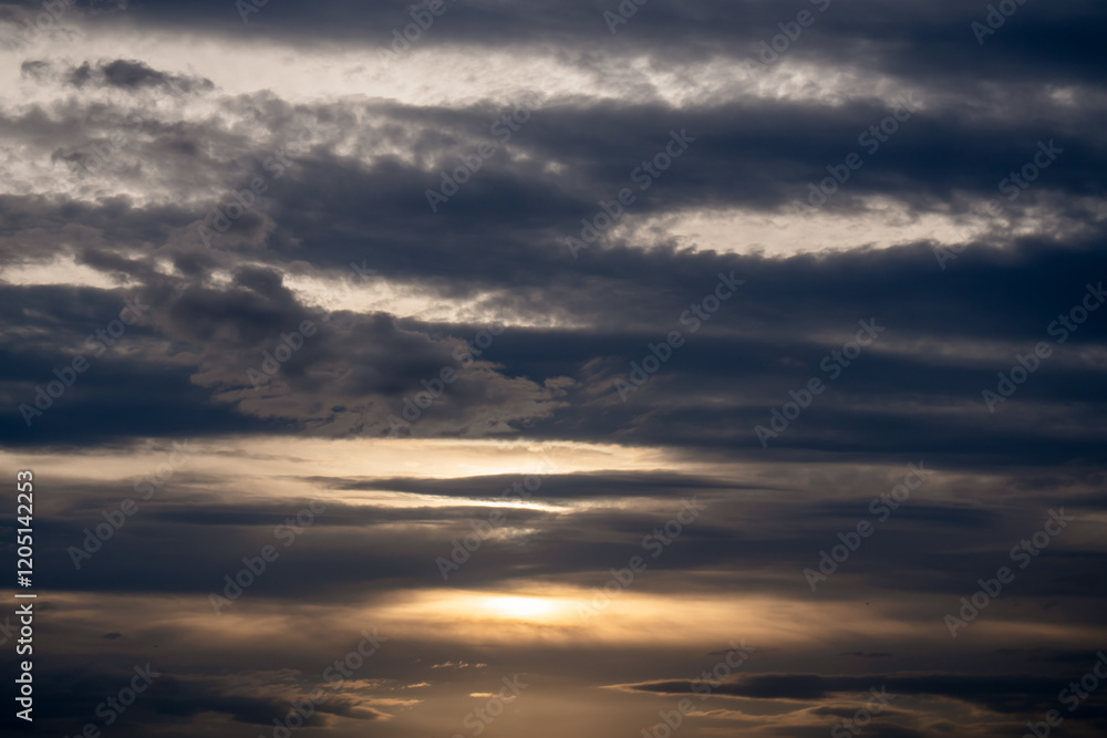 Clouds Sunset Sky: Atmospheric layers during golden hour sunset, showcasing layered cloud formations. Clouds Sunset Sky: Atmospheric layers during golden hour sunset, showcasing layered cloud formations.