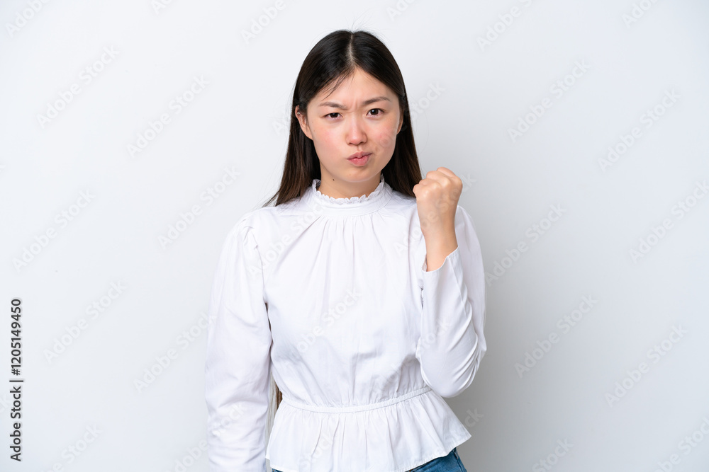 Young Chinese woman isolated on white background with unhappy expression Young Chinese woman isolated on white background with unhappy expression