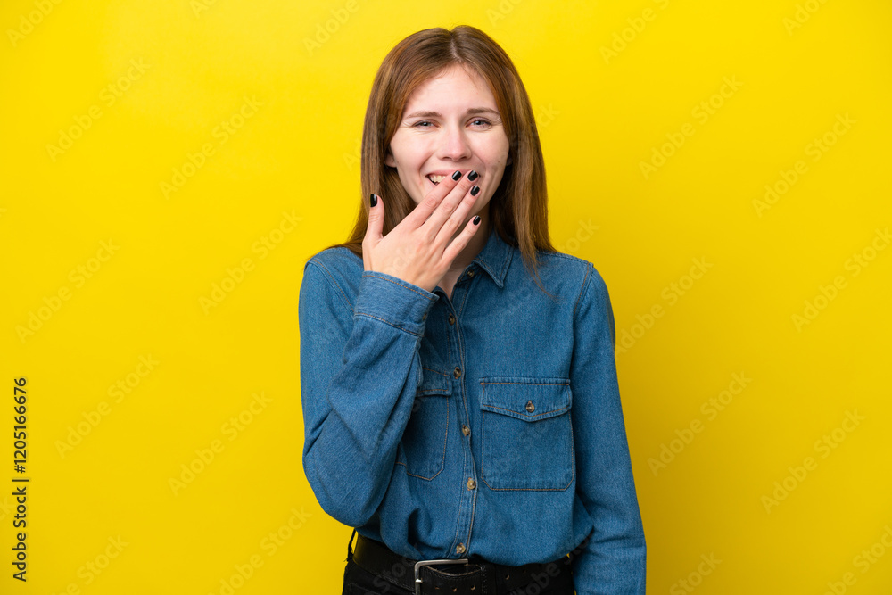 Young English woman isolated on yellow background happy and smiling covering mouth with hand Young English woman isolated on yellow background happy and smiling covering mouth with hand