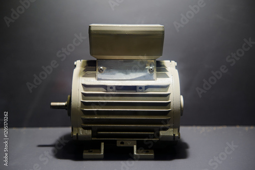 Bild auf Leinwand Industrial Electric Motor Isolated on Dark Background in Studio Lighting