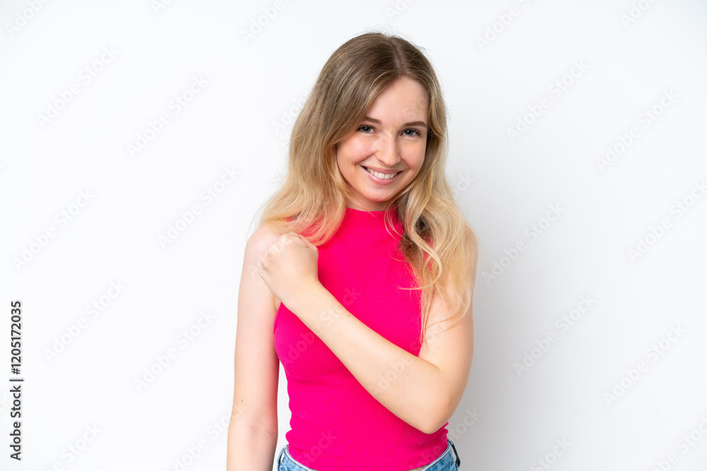 Blonde English young girl isolated on white background celebrating a victory Blonde English young girl isolated on white background celebrating a victory