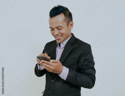 Happy smile face of Asian businessman using smartphone in concept of trading app. photo