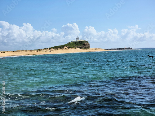 Nobbys Headland on a sunny day with white clouds. Newcastle New South Wales, Australia photo