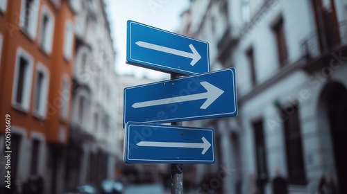 A collection of blue directional signs pointing right and left, set against a blurred urban background, indicating various paths ahead.
