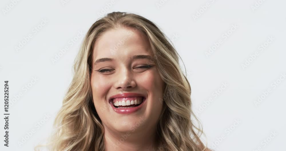 Young Caucasian plus size woman with long blonde hair and blue eyes smiling Young Caucasian plus size woman with long blonde hair and blue eyes smiling