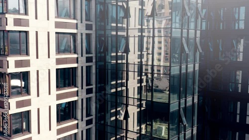 Captivating aerial view of modern architecture showcasing sleek lines and urban landscape during bright daylight in a bustling city
