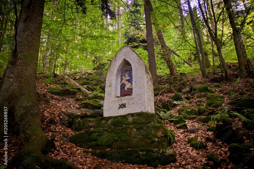 Old stone Stations of the cross in forest near Prachatice, Czech republic