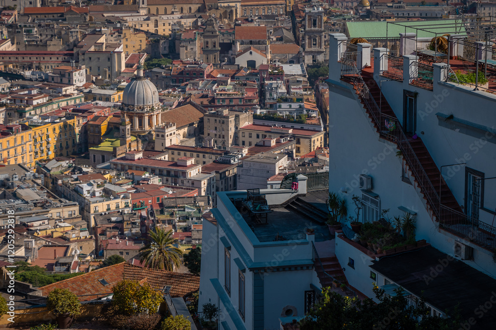 Detail view of mount vesuvius and the city of naples below, looking from Sant elmo castle above the city. Summer or autumn scene with majestic volcano view