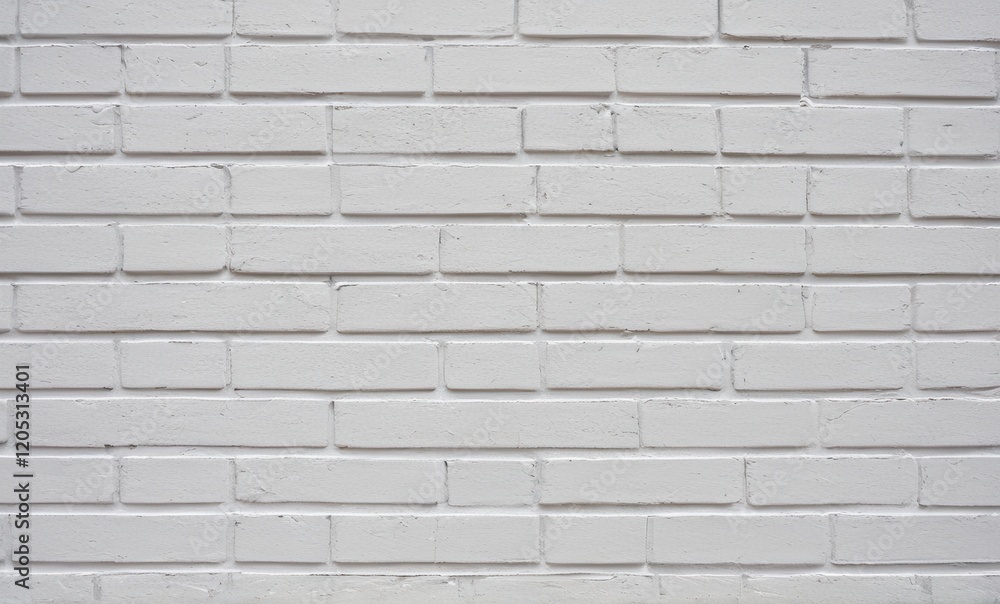 White brick wall with a textured surface, showing uneven bricks...Concept: Raw material, texture, background White brick wall with a textured surface, showing uneven bricks...Concept: Raw material, texture, background