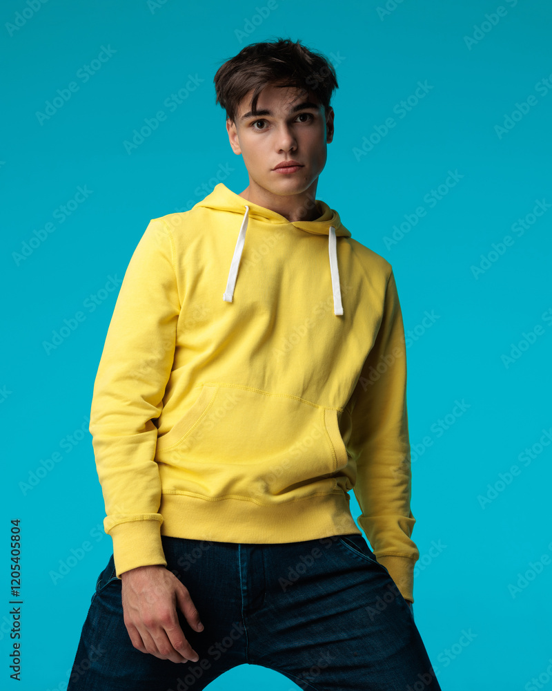 Fototapeta premium closeup of young alpha male standing with spread legs