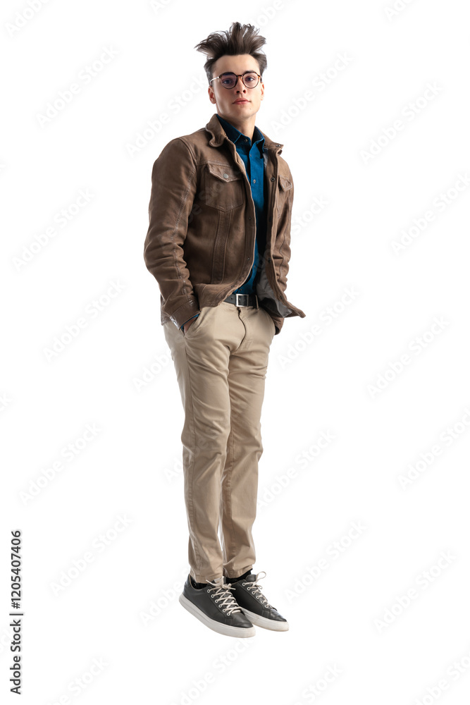 smart casual man with messy hair jumping in the air smart casual man with messy hair jumping in the air