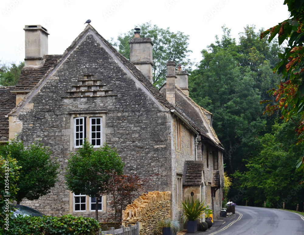 Fototapeta premium Cotswold stone house in the village of Castle Combe, Cotswolds, Wiltshire, England, UK
