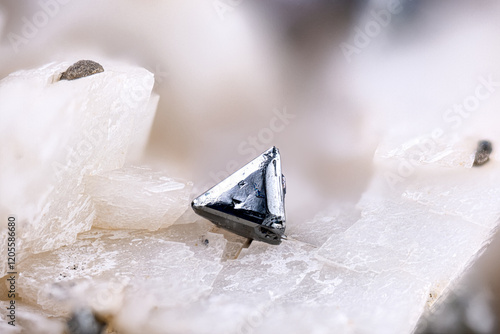 Tetrahedrite crystal on dolomite. Specimen from Usclas-du-Bosc, Loiras, France. Micro photography extreme close-up. microscope mineral crystal photography for Scientific use. 
 photo