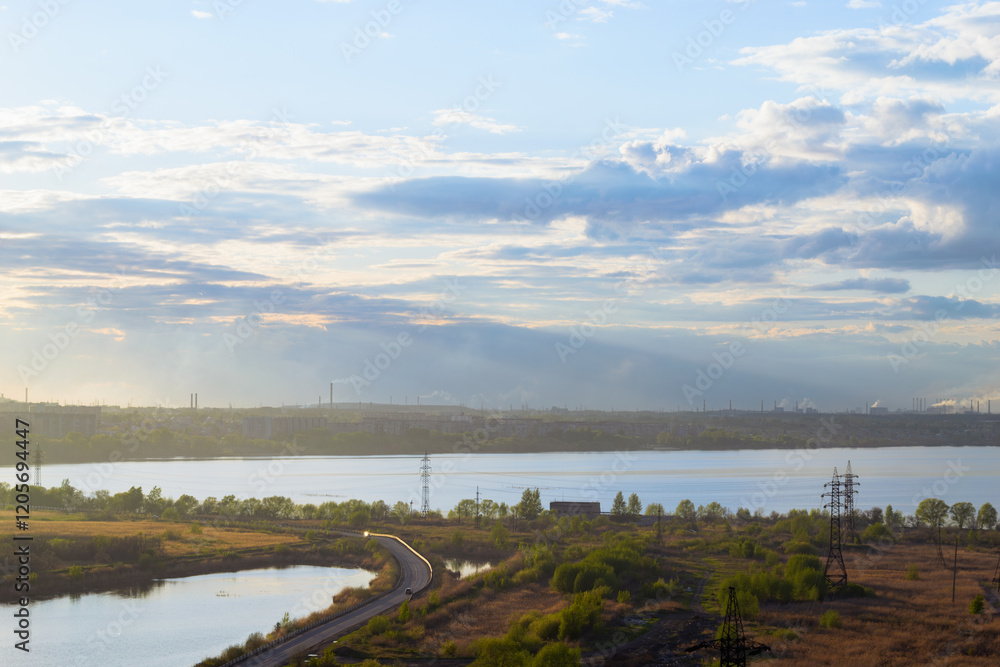 Top view of the picturesque natural and urban landscape at sunset Top view of the picturesque natural and urban landscape at sunset