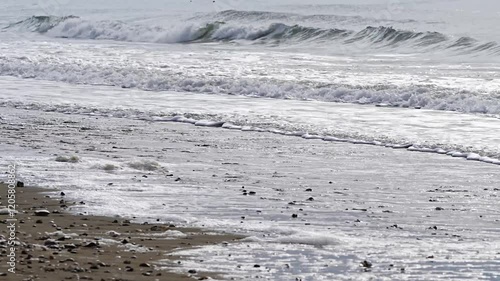 surf on the beach in winter photo