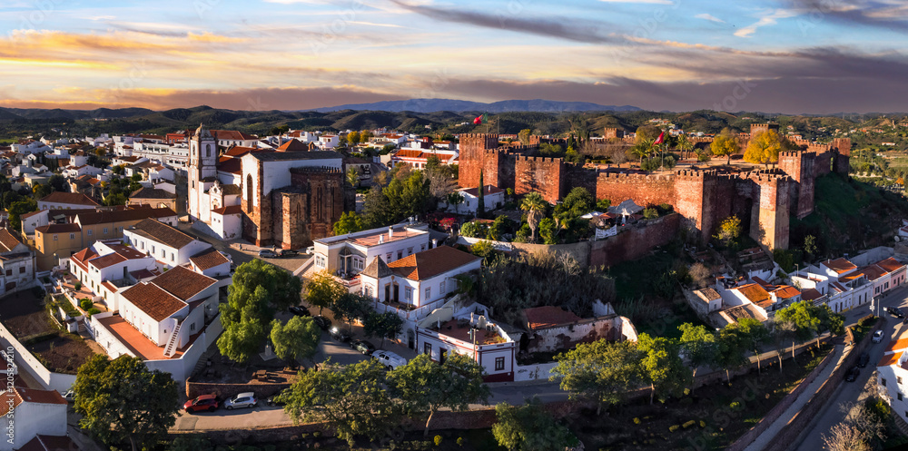 Naklejka premium Portugal travel and landmarks. Historic town Silves with well preserved castle, former capital of Algarve. aerial high angle view
