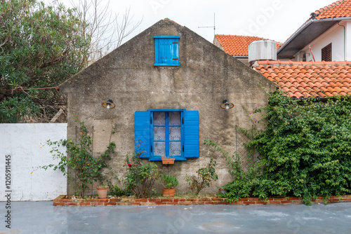 Picturesque view with blue window in Nin. Nin is a small town located near Zadar, dating back to roman times.