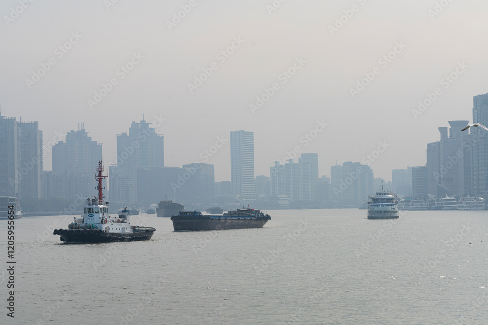 Fototapeta premium Cargo ships on the Huangpu River in Shanghai, China