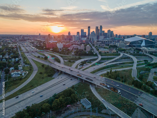 Aerial shot of downtown Minneapolis, Minnesota,  featuring highway interchange at sunset