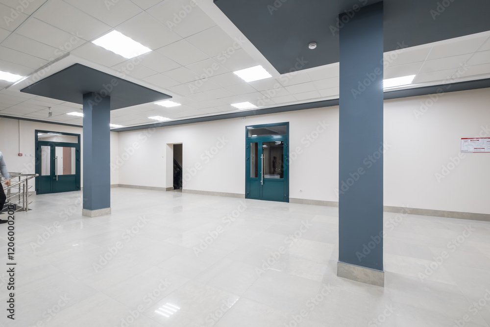 panorama view in empty modern hall with columns, doors and panoramic windows at night panorama view in empty modern hall with columns, doors and panoramic windows at night