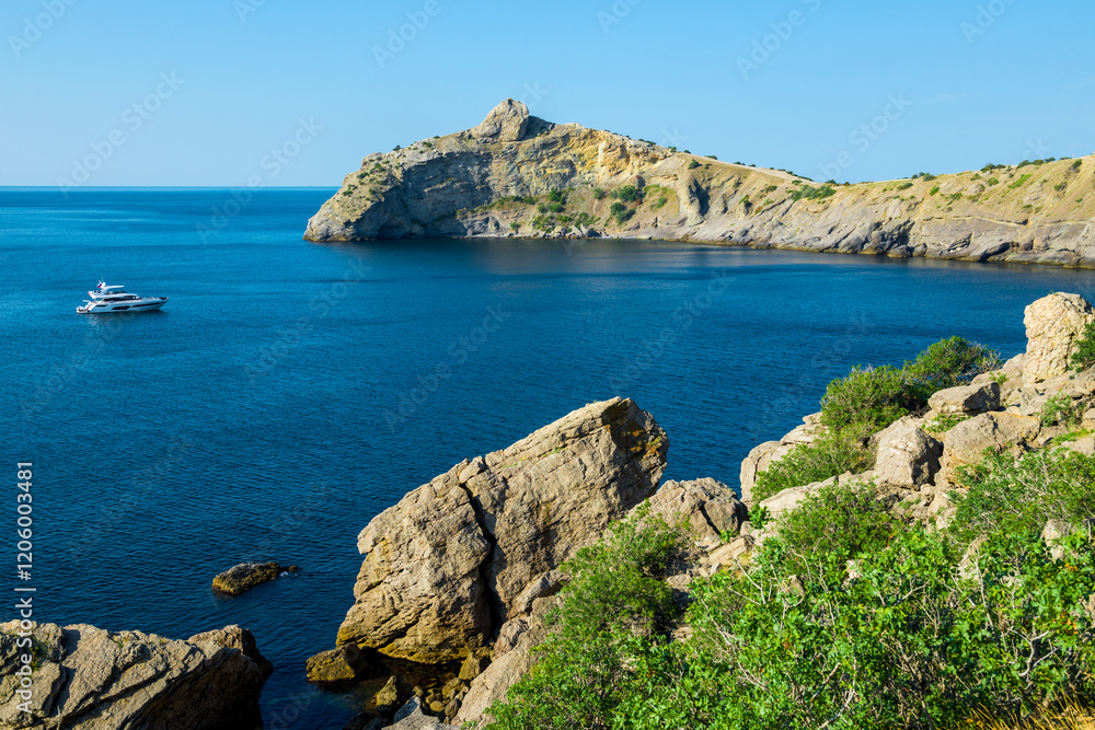 Picturesque seascape with beautiful view of Cape Kapchik and the Black Sea. Crimean Peninsula. Russia Picturesque seascape with beautiful view of Cape Kapchik and the Black Sea. Crimean Peninsula. Russia